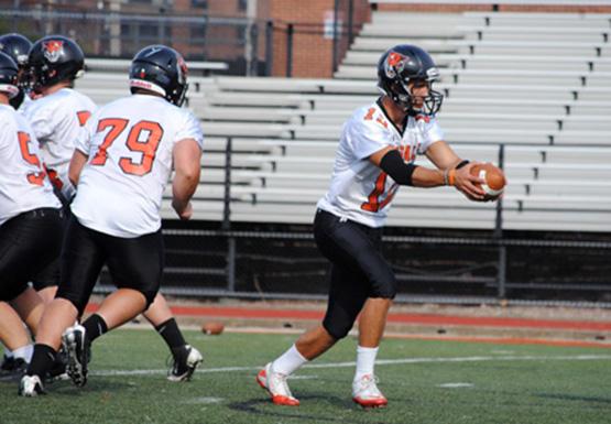 Quarterback Casey Kacz (right) will be key to the Bengals offensive success Saturday against Cortland.
