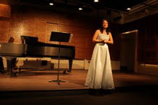 Holly Bewlay, standing, and Emily Boyce performed at the Louis P. Ciminelli Recital Hall Thursday night. The two share a professional bond that reflects upon their similar backgrounds.