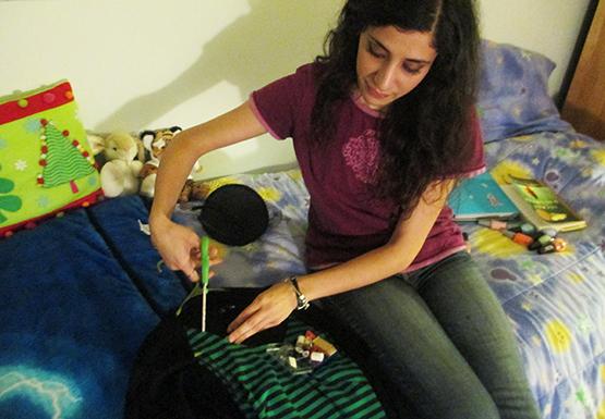 Student Christy Tolevski gets to work on a do-it-yourself witch costume. For students on a budget, DIY outfits are a go-to and the materials could be right in your own closet.