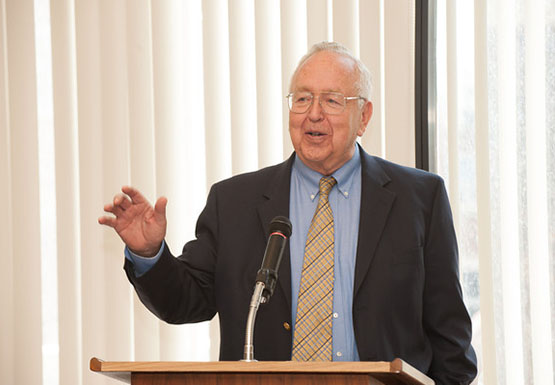 Ross B Kenzie speaks at a luncheon for the scholarship he funds for students demonstrating excellence academically, and contributing to the community. 