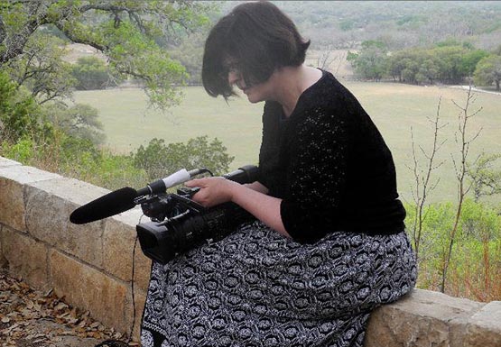 Associate COM professor Meg Knowles, hard at work on her current documentary project, entitled Runaway. The film, currently in its editing stage, is about her sisters disappearance during summer camp in 1973. 