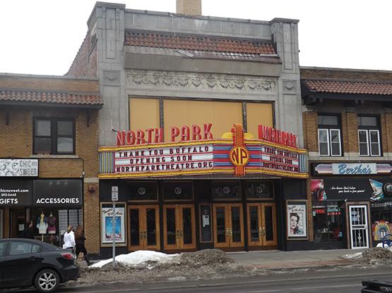 North Park Theatre, off the corner of Hertel and North Park avenues, has been closed since last May, but business on the Hertel strip have had signs in their windows in support of the establishments renovation and reopening.