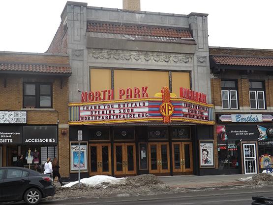 North Park Theatre, off the corner of Hertel and North Park avenues, has been closed since last May, but business on the Hertel strip have had signs in their windows in support of the establishment's renovation and reopening.