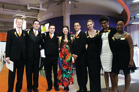 From left to right, honor students Michael Filipski, Tim Anderson, Tim Schuler, Devan Brady, Jordan Sims, Tiffany Basset, Tiffany Guines, Azda Beda.