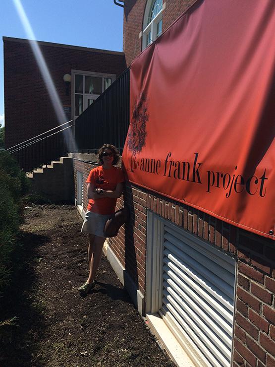 Assistant Director Eve Everette in front of the project’s headquarters on Buffalo State’s campus, Donald Savage Theater Building