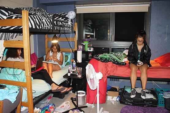 From left to right, freshmen Jenelle Graap, Mariah Ortiz and Jessica Giannitsis are sharing a room designed for only two students. All freshmen are in triple rooms this year.