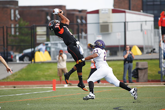 Buffalo State senior wide receiver Ryan Carney hauled in a 39-yard touchdown pass from quarterback Kyle Hoppy late in the fourth quarter to bring the Bengals within 29-21.