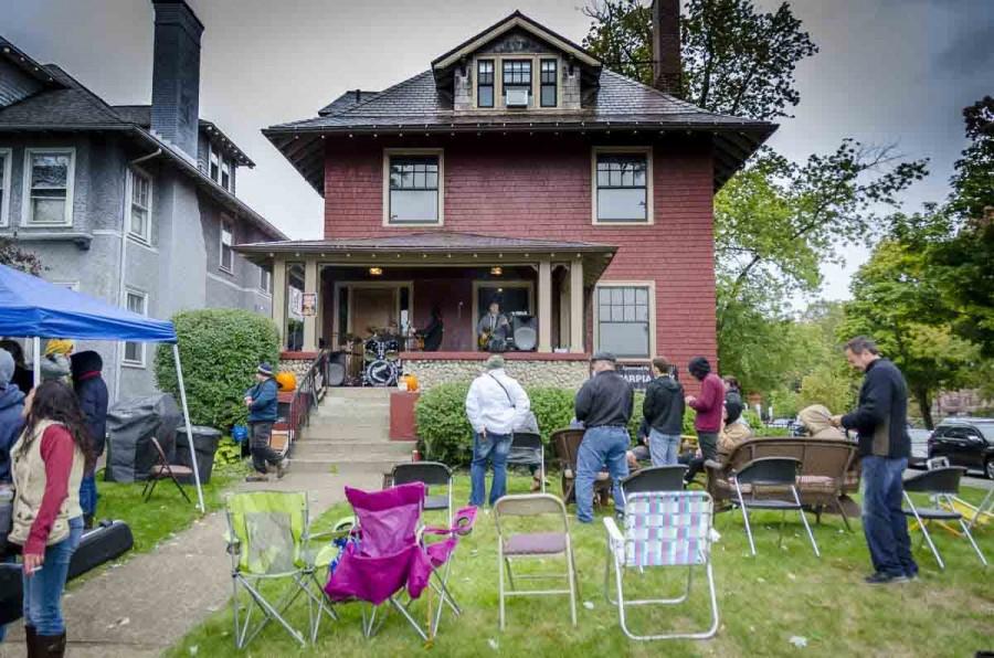 Despite not-so-ideal weather, Buffalonians still out to Elmwood Village for Porchfest to support the local music scene in Buffalo.