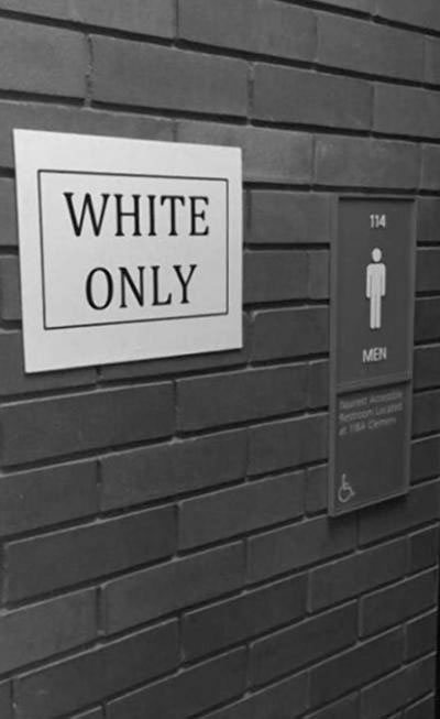 WHITE+ONLY+signs%2C+such+as+the+one+shown+above%2C+were+placed+all+over+University+at+Buffalos+campus+started+a+lot+of+discussion+about+racism.