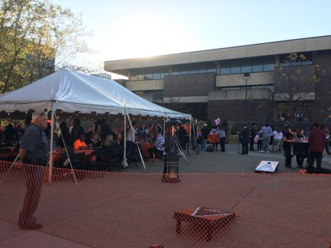 Buffalo State students, parents and alumni enjoy the after-parade party in the plaza.
