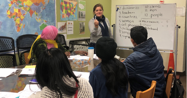 Students learn English during ESL class at Jericho Road. 