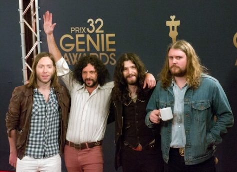 The Sheepdogs band standing in a row side by side