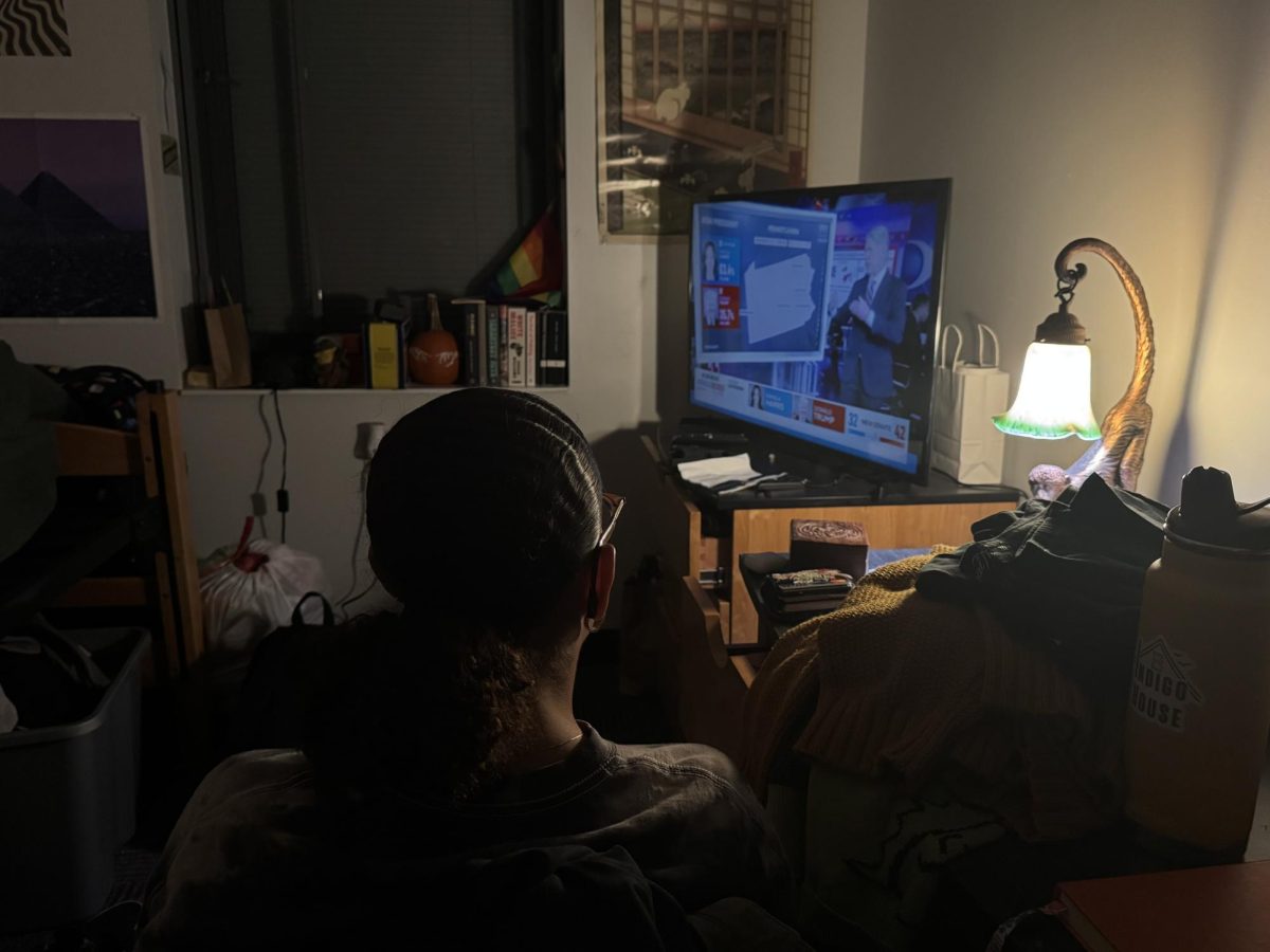 A student engrossed by the election results