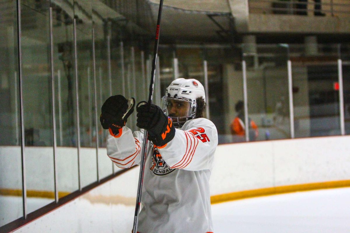 Bengals Forward Donovan Powell celebrating.