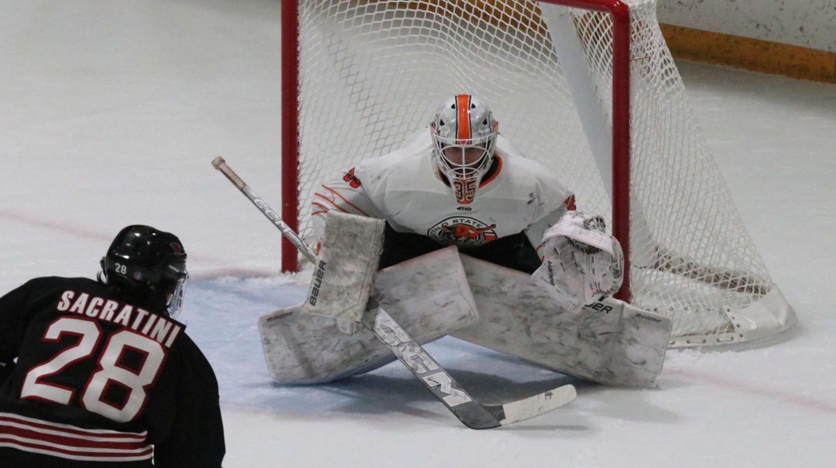 Bengals Goalie Marcus Cumberworth squaring up to make a save.