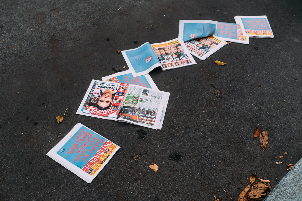 Newspapers and magazines thrown on the ground - Ivan Radic