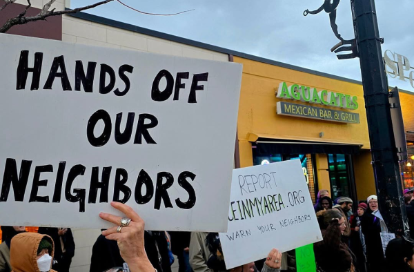 Protesters demanding ICE not to take their neighbors
