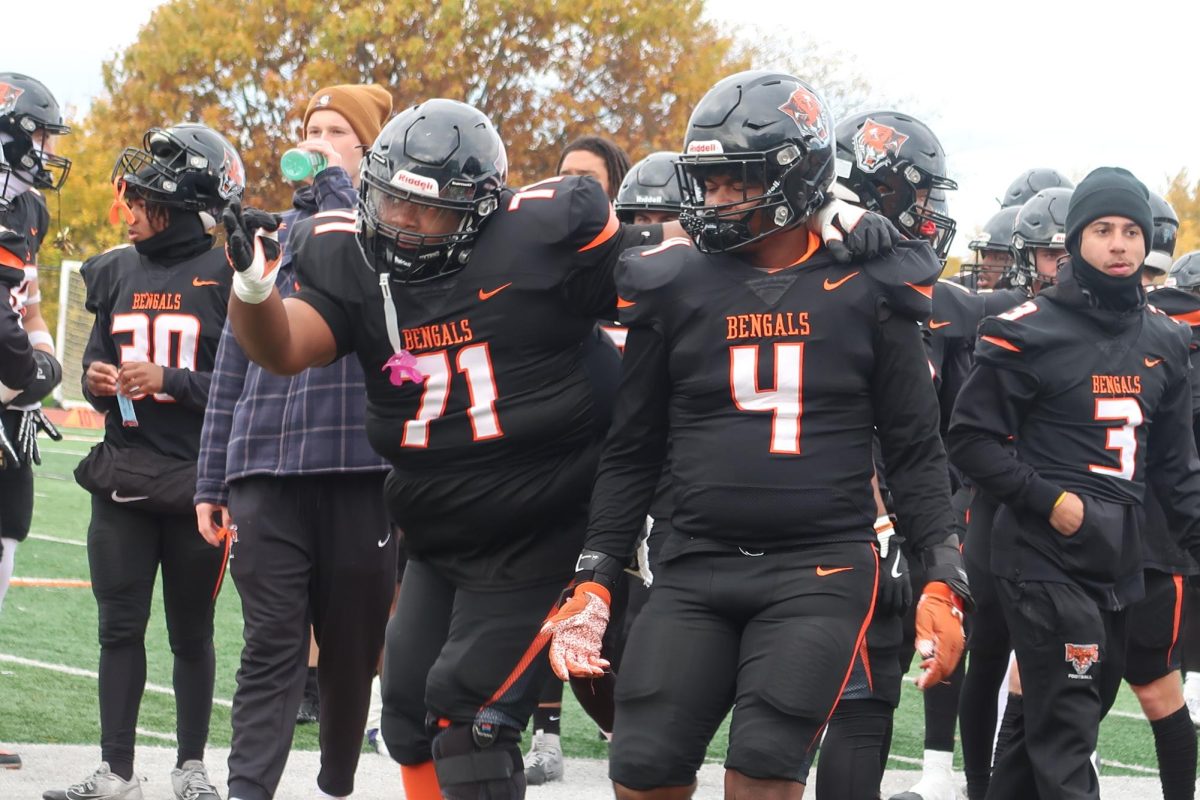 Shaquille McWhite (71) and Antuane Hawkins (4) get their griddy on.