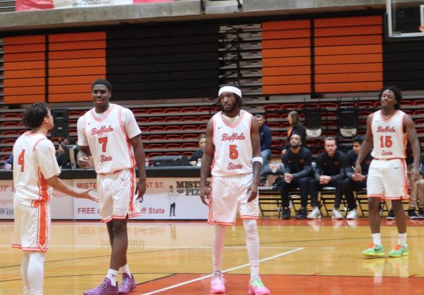 The 2025 Buffalo State Men's Basketball team taking the court.